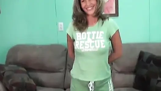 Mature skank-ass whore gets naked and spreads her legs in the living room
