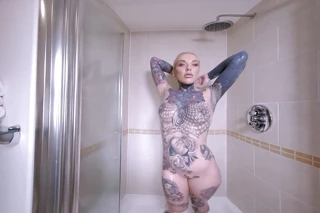 New Scene Featuring the Sexy as Hell Tattooed Sex Goddess Lauren Brock Getting Wet in the Shower