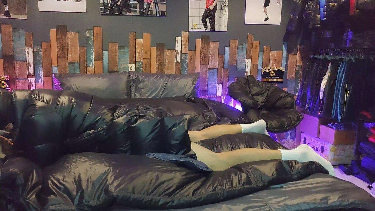 Cock Rubbing Down Jacket on Shiny Nylon Bed