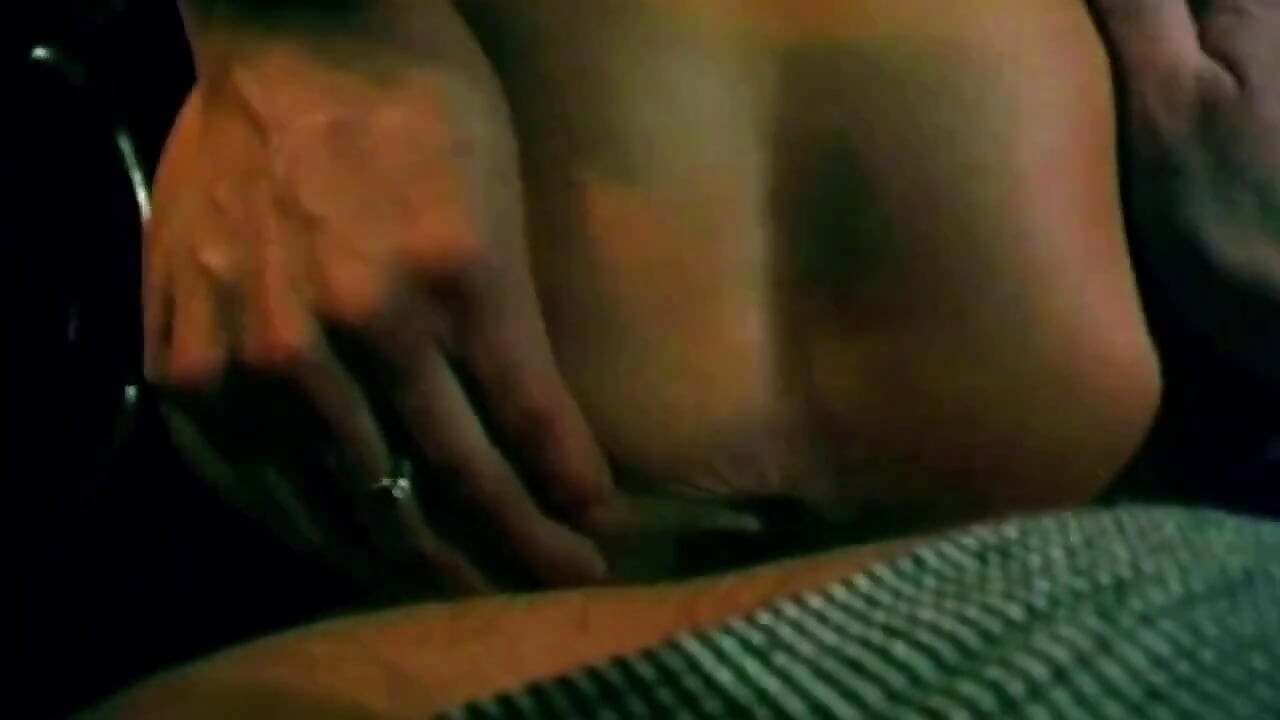 Brunette Fingers Herself Deep in Dark Car