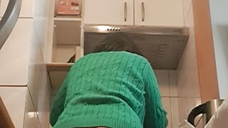 Mom in the kitchen seducing without panties