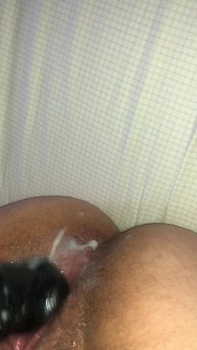 Creamy pussy on black dildo