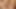 Tall blonde tranny lays in bed and strokes her large cock