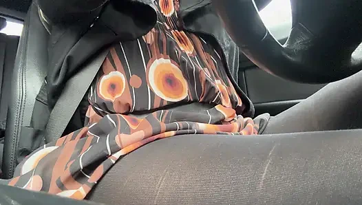 Elegant stepmom drives to the office wearing tights and a beautiful dress