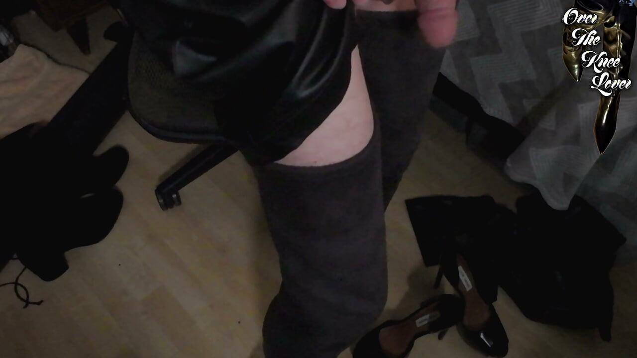 crossdresser autoblows in a leather dress and suede thigh high boots