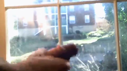 masterbating at the window for the neighbors