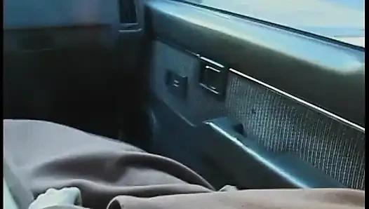 Commuter redhead carpools with creep who debases her in car in city traffic