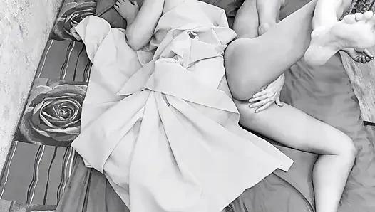 Couple caught on camera having sex in bed .