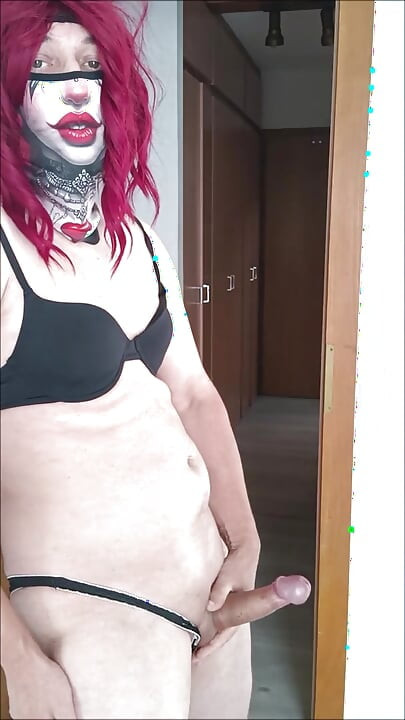 A horny trans woman undresses and masturbates to ejaculation.