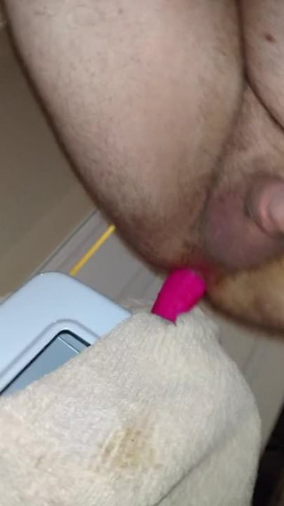 Stretching my ass with a big pink dildo