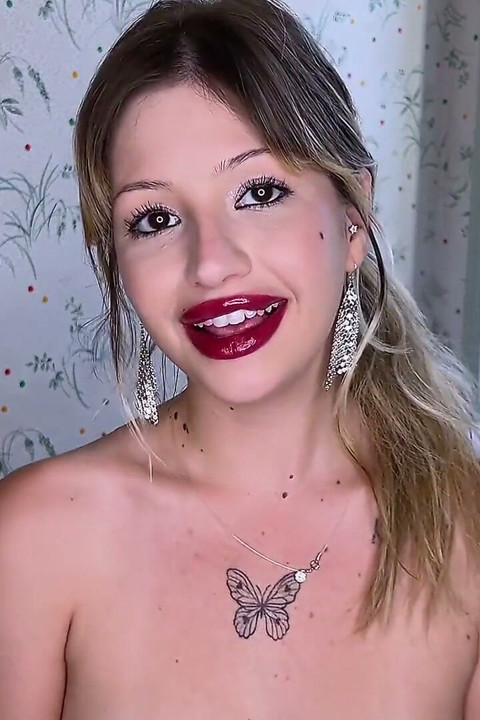 Cherry Red Lipstick Lips Tease Kisses to Camera