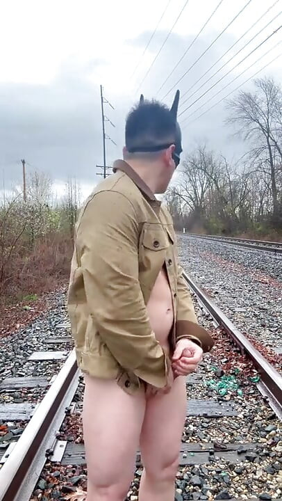 Rain-soaked Railroad Exhibition Muscular Asian Hunk Strips, Flexes, Cums Hard & Marks His Territory