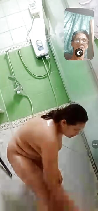 Taking a bath until she dressed up for her duty.