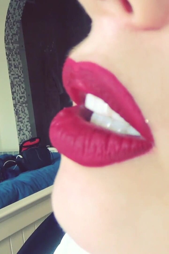 Smoke from dark red big lips
