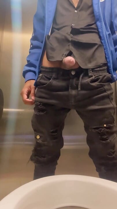 Enjoying Masturbation in a Public Bathroom