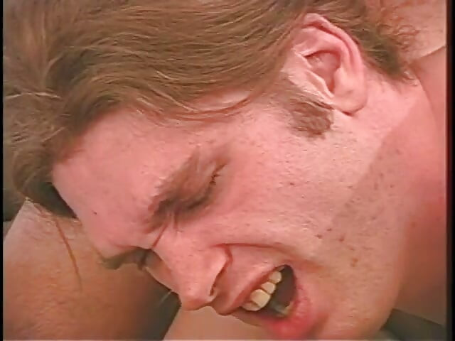 Brunette MILF fucks cute bi young guys with strapon
