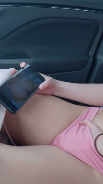 Teen masturbates in a public car park watching her porn video - ProgrammersWife | Clip 1