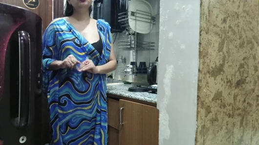 Indian stepmom watches and enters her stepson's Kitchen to fuck him.