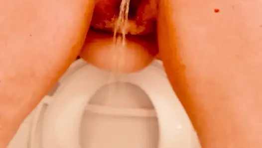 Pissing different ways around the bathroom