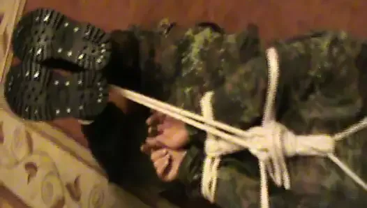Hogtied armyslave is stomped