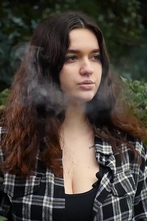 Sweet and Busty Russian Babe Smoking Cigarette in Nature
