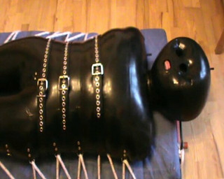 Restrained in the inflatable rubbersuit