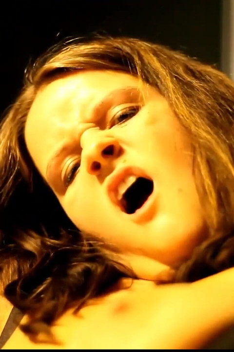 Milf moans in pleasure as she strokes her hard clit