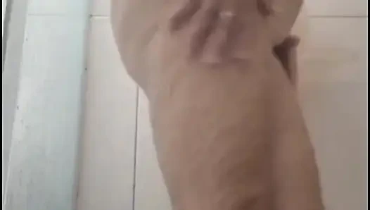 My stepmom taking a shower after fucking, to get the cum out of her.