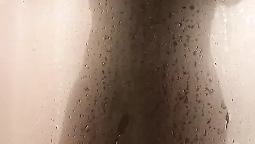 Check out this steamy shower scene with hot naked Simon