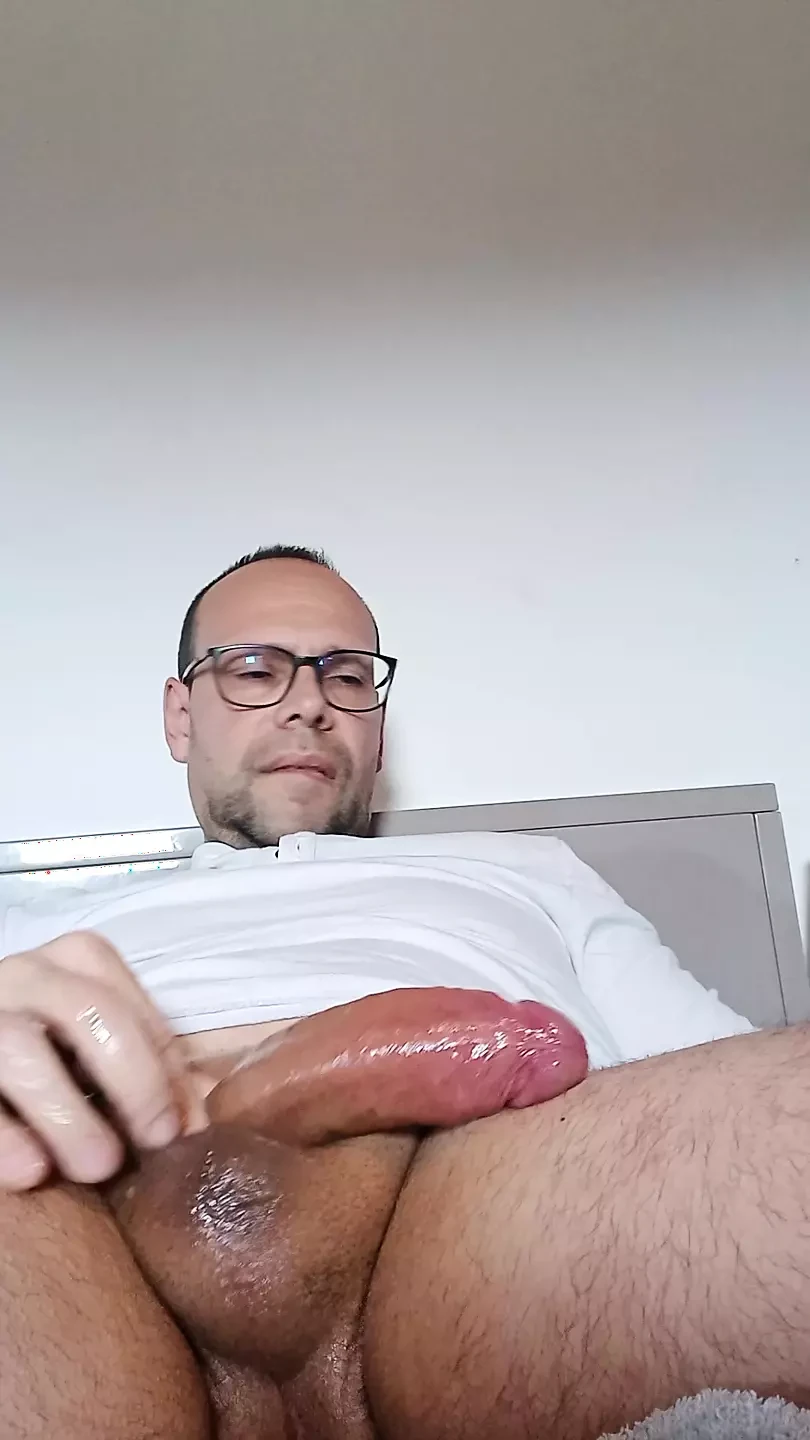 Several spurts of cum spurt out of my hard, well-oiled cock
