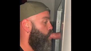 Bearded Guy Sucking Cock at the Gloryhole