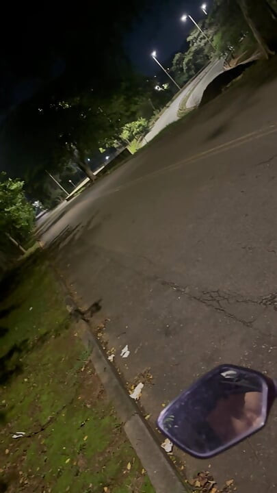 Big, beautiful penis of a Brazilian model on a motorcycle without underwear, showing it off in public.