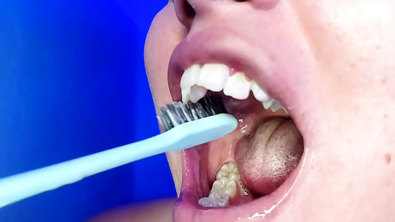 Brushing My Teeth and Showing You My Teeth (close-up)