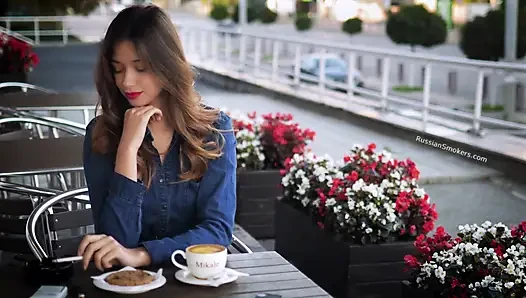 Magnetic Russian Beauty Playing with Cigarette Smoke