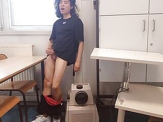 Cum at school, this horny student twink wanks his smooth cock and squirts jizz riskyly at school in a classroom on classmate des
