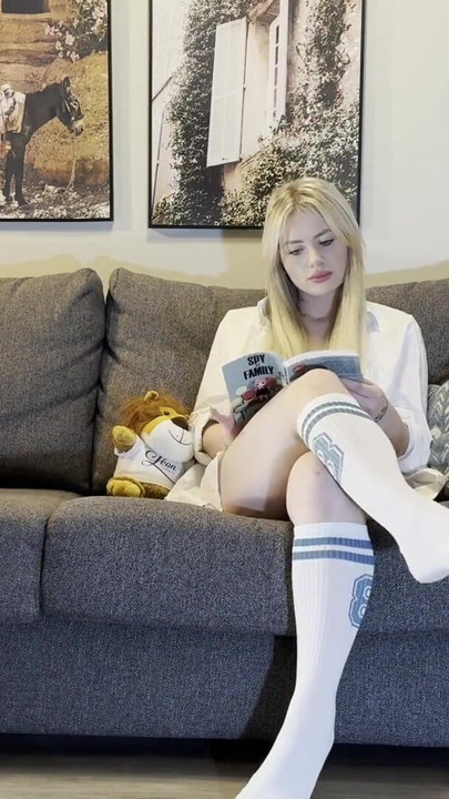 Key moment from "Busty All Natural Big Tits Big Ass Thick Thighs Sexy MILF reads a Book and takes her Panties Off on the Couch"