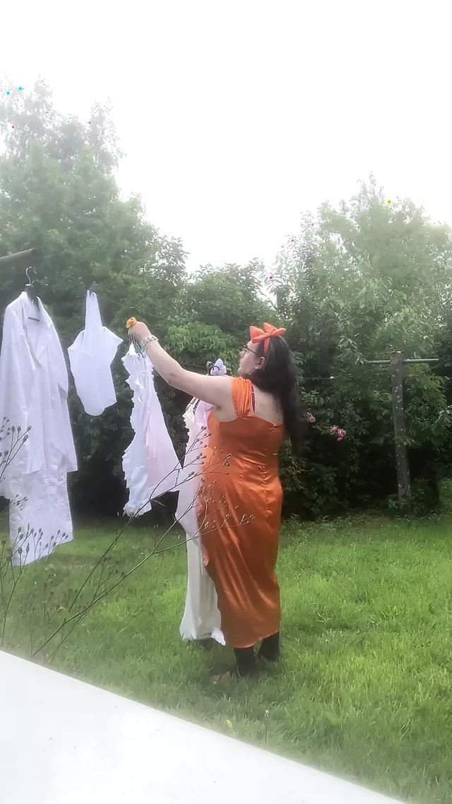 In orange dress with laundry pickup