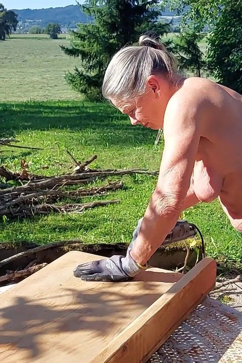 Granny Works Naked in Her Garden!