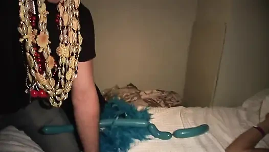 Festive girls naked fun on the bed