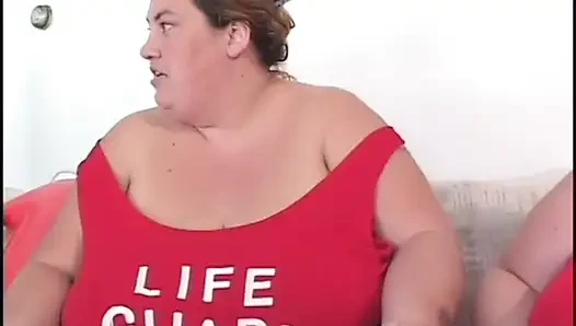 Fat bellied chick in red uniform rides one long stick