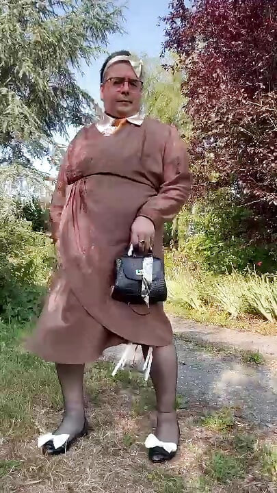 Wearing a brown Portefeuille-style dress for an evening