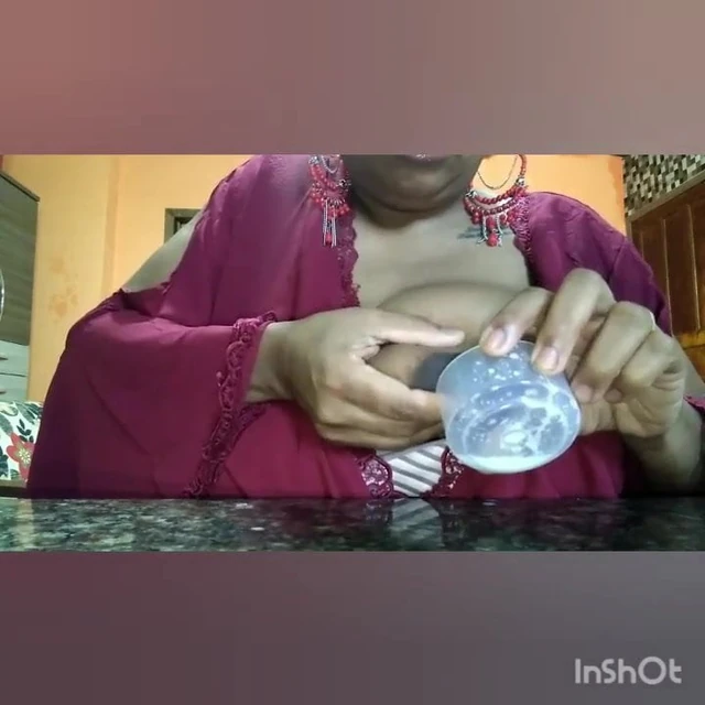Brazilian woman squeezes milk from big tits