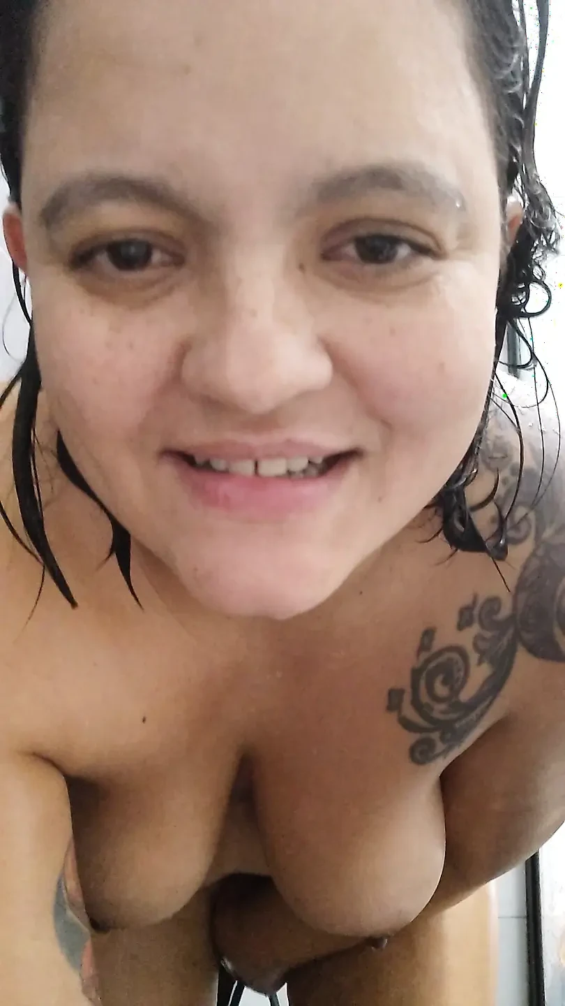 Alone at home she masturbates in the shower