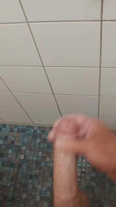 Wanked in the swimming pool under the shower | Clip 1