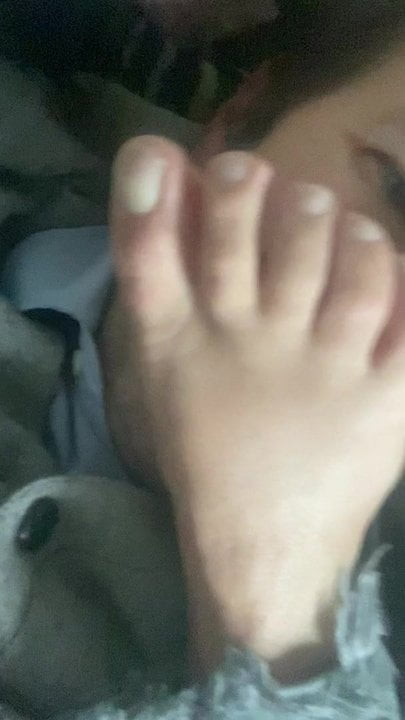Foot on face