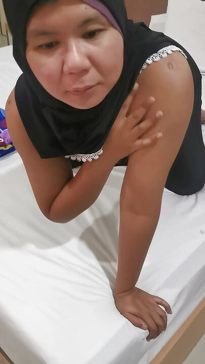 A Muslim girl has just been exercising tiredly before she finds a big stuffed in her mouth.