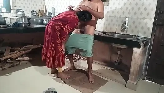 Husband and wife having sex in the kitchen
