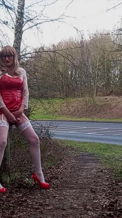 Crossdresser Roadside Wanking in Red PVC | Clip 1