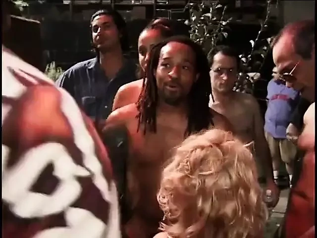 Pretty black big boobed lady spreading her legs in a gangbang action