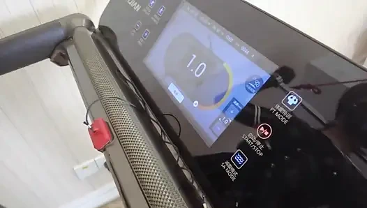 Mz24 - a Girl Bound to a Treadmill with Metal Restraints and Shackles